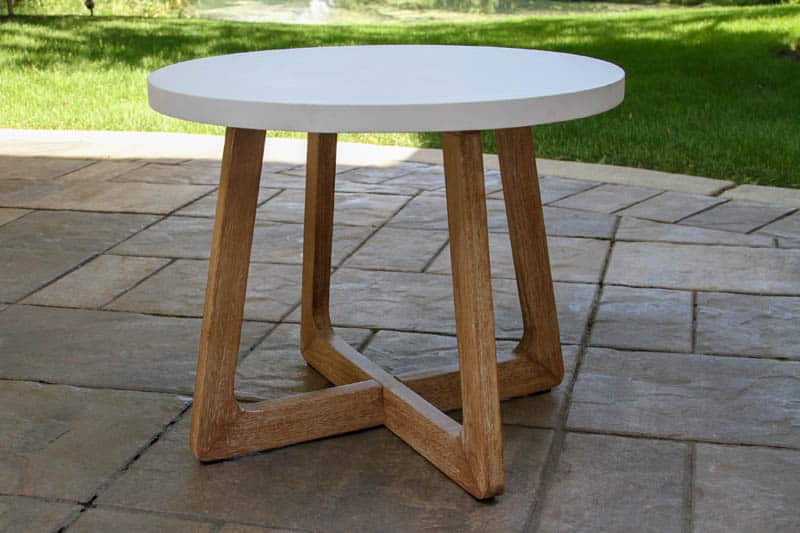 Outdoor Interiors, 20” Round Ivory Composite & Eucalyptus Wash Accent Table